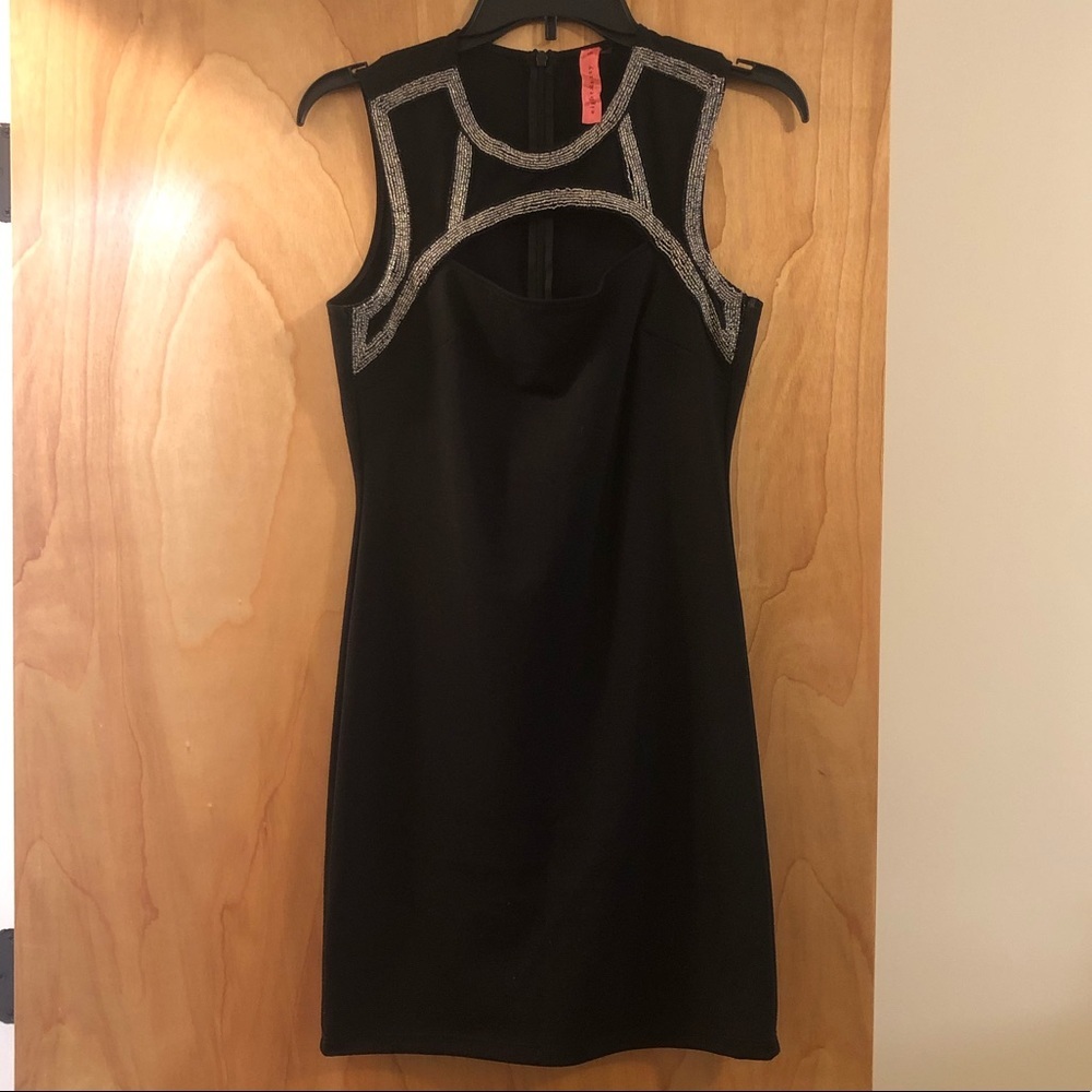 Eight sixty black dress with cut out top.  Medium